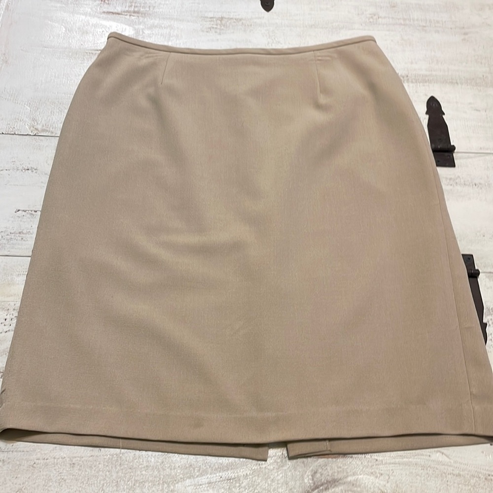 Pencil skirt, size 14, tan colored, fully lined. Excellent condition.